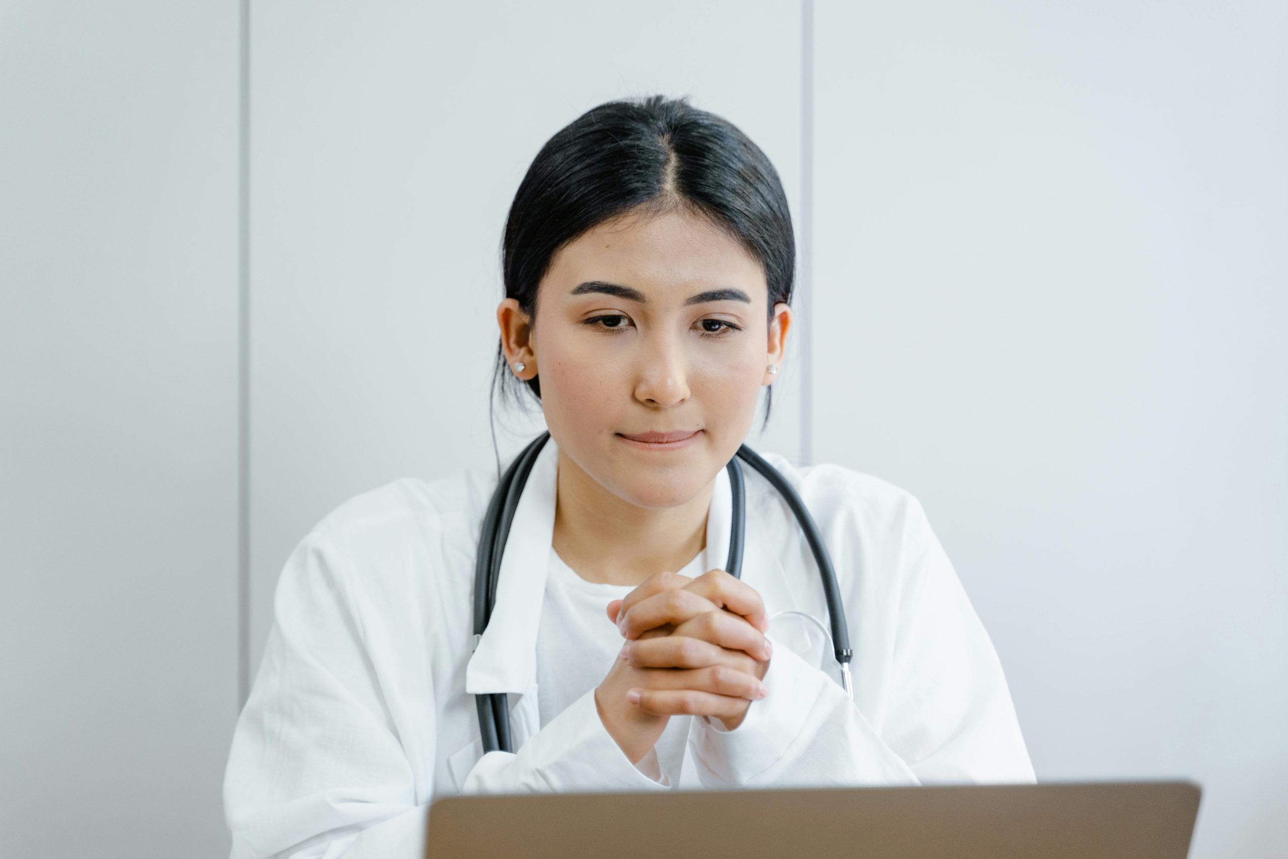Doctor sitting at a computer